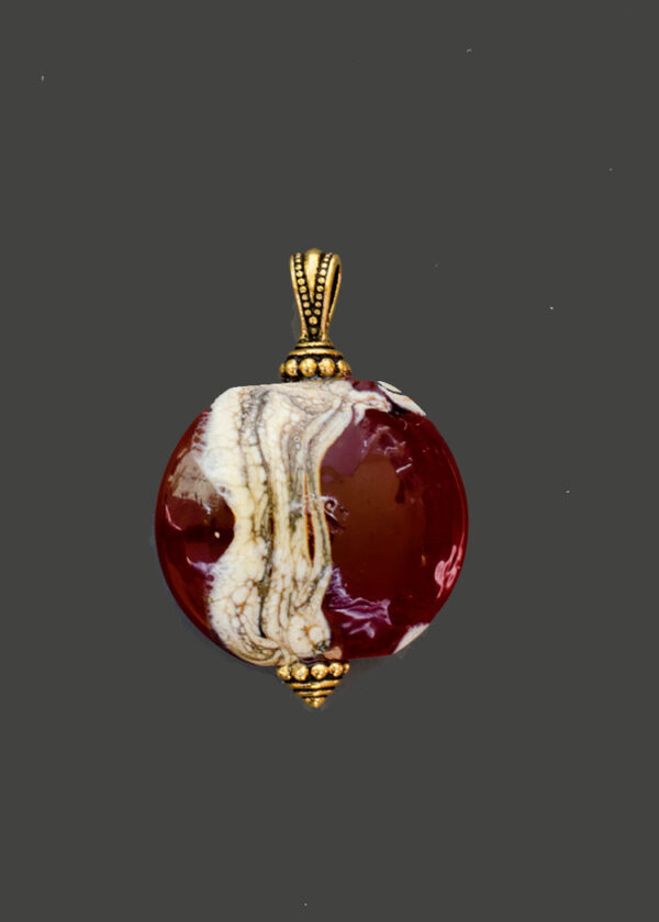 Cinnabar and Silvered Ivory Glass Pendant