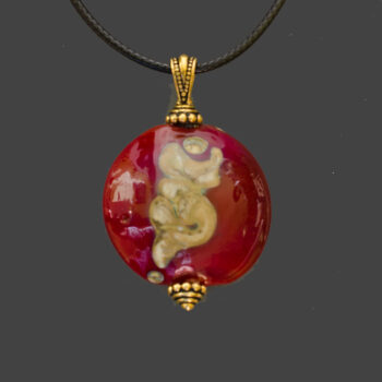 Cinnabar and Silvered Ivory Glass Pendant