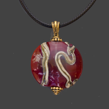 Cinnabar and Silvered Ivory Glass Pendant