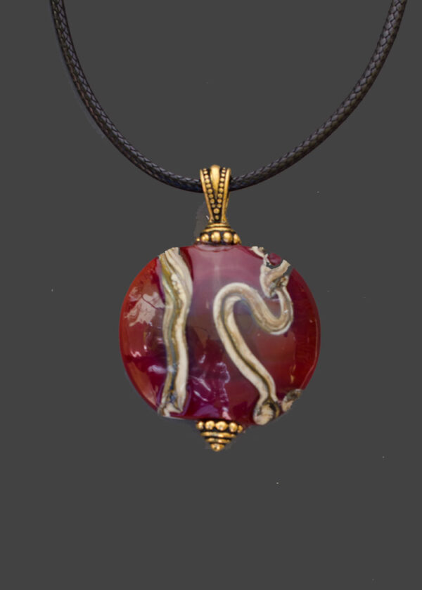 Cinnabar and Silvered Ivory Glass Pendant