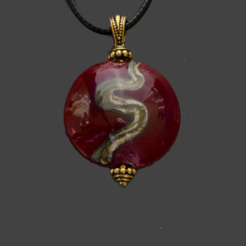 Cinnabar and Silvered Ivory Glass Pendant
